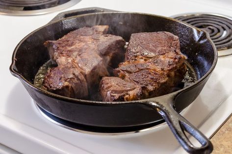 A thick slice of center-cut beef shank looks remarkably like a well-marbled steak, and is often labeled as shank steak in retail stores. They're too tough for grilling, but like chuck steaks, they're ideal for braising. The long, slow cooking process softens the tough muscle fibers and connective tissues, leaving the meat fork-tender with a... Shank Steak, Meat Cooking Temperatures, Beef Shank Recipe, Pork Cooking Temperature, Grilling The Perfect Steak, Steak In Oven, Cooking The Perfect Steak, Beef Shank, Ground Beef And Potatoes