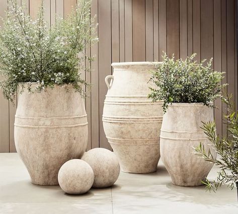 Outdoor Planters, Patio Planters & Plant Pots | Pottery Barn Mediterranean Plants Landscaping, Planters Patio, Concrete And Wood, Outdoor Table Tops, Black Planters, Faux Olive Tree, Mediterranean Plants, Flower Containers, Patio Planters