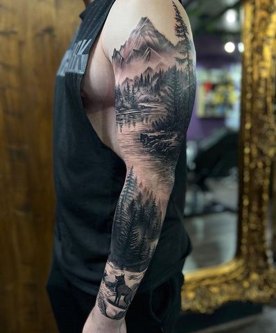 Creative Sleeve Tattoos for Men Forest Sleeve Tattoo For Men, Full Sleeve Forest Tattoos For Guys, Creative Sleeve Tattoos, Mountain Scene Tattoo Sleeve, Forest To Ocean Tattoo Sleeve, Wolf Forrest Tattoo Sleeve, Sleeve Tattoos For Men, Sleeve Tattoo Ideas, Tattoo Ideas For Men