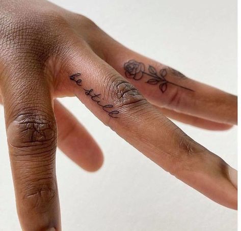 These Chic Finger Tattoos For Women Will Enrich Your Look Simple Word Tattoos, Hand Holding Tattoo, Inner Finger Tattoo, Finger Tattoos Words, Tattoos Finger, Red Heart Tattoos, Cuff Tattoo, Cute Finger Tattoos, Small Finger Tattoos