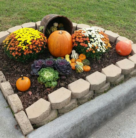 Flower bed creation I made for fall Flower Bed Halloween Decor, Half Moon Flower Bed, Fall Flower Bed, Circle Flower Bed Around Tree, Small Circular Flower Bed Ideas, Flower Bed With Bed Frame, Fall Curb Appeal, Fall Garden Decor, Landscaping Around House