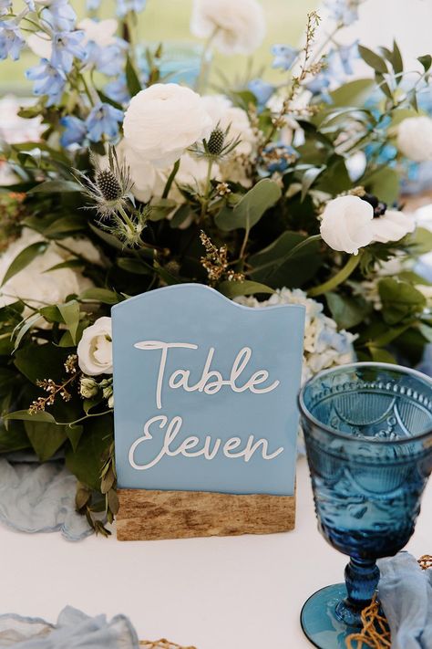 Faux Sea glass table numbers (made from acrylic plastic sheets)  are the perfect way to style your tables for your beach look!  PRODUCT DETAILS: -Blank sea glass are not available for sale. -Driftwood stands may be added on but not sold by themselves. -Sea glass is faux, it is NOT real sea glass, made from plastic acrylic. They are fully painted on the back and not transparent.  - Minimum of 5. Samples are not for sale. -This listing is for one sea glass table number.  -Engraved lettering will be in white. -Sea glass is approximately 5X7". -If you don't see a color or size you are looking for, please contact me for an additional fee. -These table numbers are cut and engraved on a laser machine and hand painted in waterproof ink.  -Driftwood is natural, picked from local beaches in Annapoli Glass Table Numbers, Sea Glass Table, Seaside Wedding Decor, Beachy Centerpieces, Glass Wedding Decor, Coastal Wedding Decor, Sea Glass Wedding, Beach Wedding Tables, Wedding Decor Table