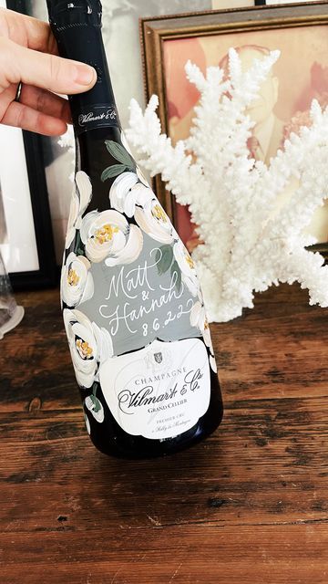 Painted Wine Bottles Wedding Gift, Engagement Painted Bottle, Painted Wine Bottles For Wedding, Black And White Painted Champagne Bottle, Champagne Bottle Painting Wedding, Hand Painted Champagne Bottle Engagement, Decorative Wine Bottles Diy, Painted Wedding Bottle, Hand Painted Champagne Bottle Wedding