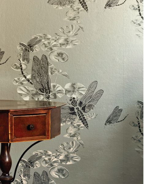 Evoking hazy summer days by the river, Dragonfly features hand-painted watercolour lily pads and graphic dragonflies meandering downstream. Gold Dragonfly Wallpaper, Monsoon Dragonfly Interiors, Watercolour Lily, Barneby Gates, Grey Illustration, Dragonfly Wallpaper, Metallic Background, Dragon Flies, Dragonfly Art