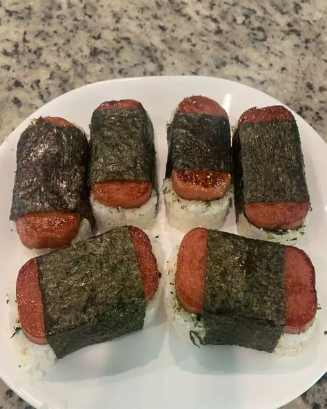 Get a taste of the islands with homemade Spam Musubi! Simple, savory, and so satisfying. 🌺🍙 Spam Musubi Hawaiian Spam Musubi Delight Ingredients: 2 cups uncooked short-grain white rice 2 cups water 1 (12-ounce) can Spam 1/4 cup soy sauce 1/4 cup oyster sauce 1/4 cup white sugar 5 sheets nori (dry seaweed) Furikake (optional) Directions: Rinse the rice under cold water until the water runs clear. Cook the rice with 2 cups of water in a rice cooker or on the stovetop according to package i... Spam Wasabi, Hawaiian Spam Musubi Recipe, Homemade Spam, Hawaiian Spam Musubi, Spam Rice, Spam Musubi Recipe, Musubi Recipe, Spam Musubi, So Satisfying