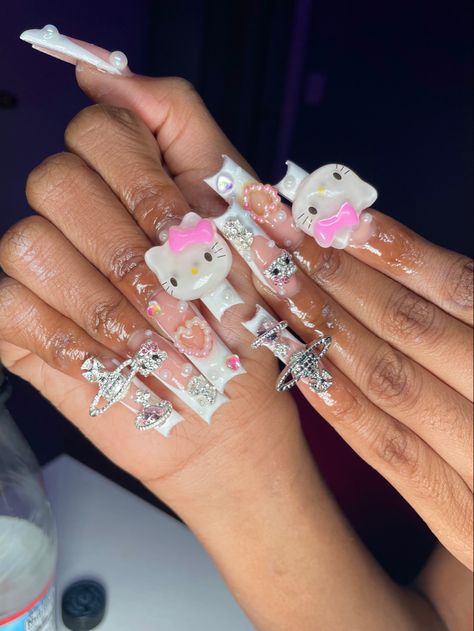 Big Hello Kitty Charm Nails, Y2k Hello Kitty Nails Short, Hello Kitty Themed Nails, Hello Kitty Junk Nails, Nails Junk, Nails On Brown Skin, Toes Nails Ideas, Press On Nails Business, Nails Hello Kitty