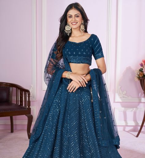 Designer navy blue thread embroidery work wedding lehenga choli with Georgette blouse and soft net dupatta 💙✨ SHOP NOW 🛍️ gotifab.com [blue lehengas,Indian wedding dresses , Indian lehengas , wedding lehenga choli for women, wedding lehengas ,blue choli ] #weddingdresses #indiantraditionalwear #navratrichaniyacholi #bluelehenga #chaniyacholi #gotifablehenga Teal Blue Lehenga, Sequins Lehenga Choli, Teal Blue Blouse, Sequins Lehenga, Partywear Lehenga, Lehenga Choli Latest, Durga Pooja, Bridal Lehenga Online, Lehenga Dress