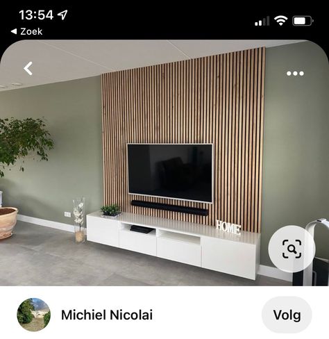 Green Wall With Panelling, Green Tv Feature Wall, Interior Wood Paneling Living Room, Wood Panelling Walls Living Room Tv, Olive Green Wood Panel Wall, Sage Green Tv Wall, Green Wall With Wood Panels, Cladding Interior Walls Living Room, Wood Panelling Walls Tv