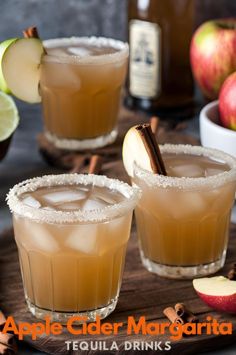 This apple flavor twist on the classic margarita is perfect for winter alcoholic drinks. Apple cider, tequila, triple sec, and pretty garnishes make this cocktail fantastic for serving  throughout the Christmas holidays. Easy margarita recipe with hints of cinnamon, that's also easy to make frozen for a margarita slush! Delicious winter cocktail recipe for holiday entertaining, like Christmas party apple cider drinks. Winter Alcoholic Drinks, Margarita Slush, Apple Cider Drinks, Winter Drinks Alcoholic, Apple Cider Margarita, Cider Margarita, Apple Margarita, Crown Royal Apple, Apple Cider Drink