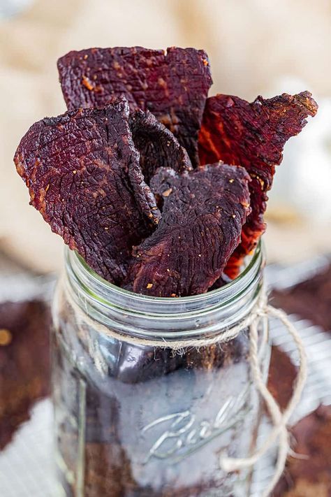 Most Amazing Beef Jerky - thestayathomechef.com Jerky Marinade Recipes, Beef Jerky Dehydrator, Beef Jerky Recipe Dehydrator, Beef Jerky Marinade, Jerky Recipes Dehydrator, Deer Jerky Recipe, Venison Jerky Recipe, Jerkey Recipes, Jerky Marinade