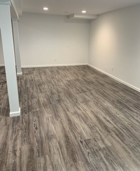 LVT vs. Carpet: What’s Better for a Basement? Basement Lvt Flooring, Basement Remodel Vinyl Flooring, Vinyl Flooring Basement Ideas, Carpet Basement Ideas, Luxury Vinyl Plank Flooring Basement, Basement Carpet Tiles, Basement With Carpet, Carpet In Basement, Basement Carpet Ideas