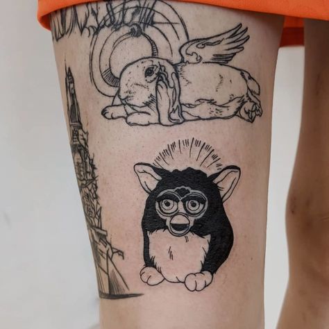 Furby Tattoo Design, Furby Tattoo, Tattoos Cartoon, Most Beautiful Tattoos, Winter Tattoo, Frida Paintings, Micro Realism, Mario Tattoo, Tattoos Creative