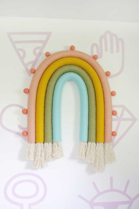 Oversized Rainbow Wall Hanging DIY! - A Beautiful Mess Book Headboard, Rainbow Wall Hanging Diy, Rainbow Headboard, Headboard Projects, Rainbow Decal, House Styling, Rainbow Diy, Pool Noodle, Rainbow Wall Hanging