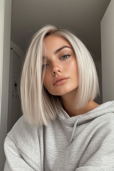 7. Blunt Lob with Platinum Blonde All-Over Color (Shoulder Length Hairstyle Ideas) - Shoulder Length Hairstyle Ideas Shoulder Length Hairstyle Ideas, Shoulder Length Hairstyle, Icy Blonde Balayage, Shoulder Length Blonde, Auburn Balayage, Lob Styling, Blonde Lob, Medium Length Curly Hair, Blonde Haircuts