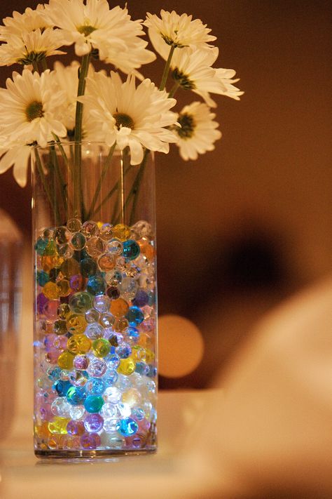 Water beads with submersable lights as centerpieces - Inexpensive, fun and very pretty! Candyland Wedding, Water Beads Centerpiece, 00s Party, Ninth Birthday, Cork Wedding, Mermaid Bride, Adventure Party, String Lights Wedding, Gel Beads