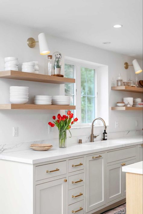 kitchen sink shelves organization Kitchen With Open Shelving And Cabinets Modern, Shelf Cabinet Kitchen Open, Upper Cabinets With Floating Shelves, White Shelves In Kitchen, Lighting Over Open Shelving In Kitchen, L Shaped Kitchen With Open Shelving, Upper Open Shelves In Kitchen, White Kitchen No Upper Cabinets, Open Shelves Kitchen Window