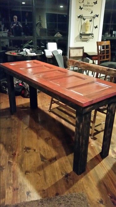 Old closet door made into table. Old Door Countertops, Old Door Desk Ideas, Table Made From Old Door Kitchen, Desk From Old Door, Desk Made From Old Door, Coffee Table Made From Old Door, Old Closet Doors, Barnwood Coffee Table, Diy Closet Doors