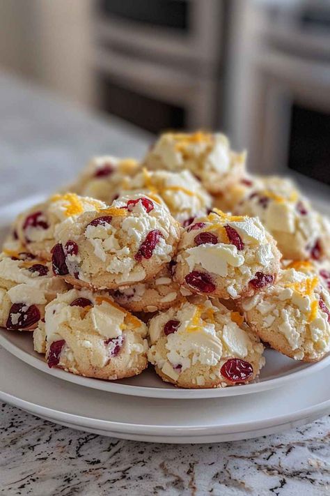 These Orange Cranberry Ricotta Cookies are incredibly soft, chewy, and full of fresh citrus flavor! With dried cranberries and a zesty orange glaze, they're the perfect treat for holidays or anytime you need a sweet, tangy snack. This easy recipe takes less than 30 minutes from start to finish. Save this pin and bake these irresistible cookies today! Orange Cranberry Ricotta Cookies, Ricotta Cookies Recipe, Holiday Platters, Ricotta Cookies, Light Roast Coffee, Orange Cranberry, Orange Glaze, Cranberry Cookies, Cookie Calories