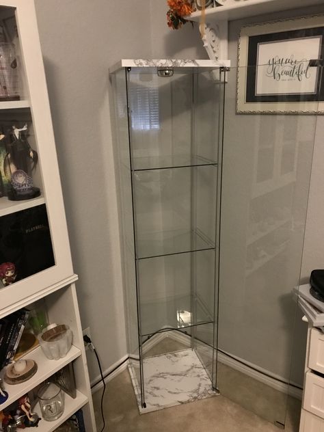 Used marble Contact paper to transform an IKEA display shelf from so-so to an elegant display. Added touch light to top for extra lighting. Ikea Glass Cabinet, Ikea Display, Ikea Detolf, Marble Contact Paper, Flower Storage, Handbag Display, Room Stuff, Moving Tips, Display Shelf