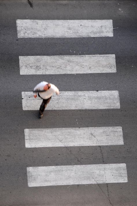 Businessman on crosswalk. Motion blurred overhead view of a businessman in shirt and tie hurriedly crossing the street at a pedestrian crossing royalty free stock photo Crossing The Street Aesthetic, Street Crossing, Crossing The Street, Pedestrian Crossing, Lamp Inspiration, Street Pictures, Shirt And Tie, Graduation Picture, Graduation Picture Poses