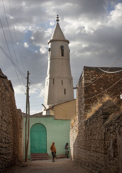 https://flic.kr/p/bA2JUv | Harar mosque - Ethiopia | Harar (or Harrar or Harer) is an eastern city in Ethiopia. The city is located on a hilltop at 1885 meters. For centuries, Harar has been a major commercial centre, linked by the trade routes with the rest of Ethiopia, the Horn of Africa, and the Arabian Peninsula. Harar Jugol has been listed in the World Heritage by UNESCO. It is "considered 'the fourth holy city' of Islam" with nearly 100 mosques, three of which date from the 1... Ethiopia Harar, Harar Ethiopia, Ethiopia Travel, Islamic Society, Africa Photography, Arabian Peninsula, Horn Of Africa, Hd Nature Wallpapers, Traditional Houses