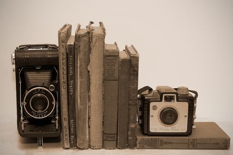 can't go wrong with old books and old cameras Vintage Camera Decor, Camera Decor, Instagram Wall, Antique Cameras, Bookcase Decor, Old Cameras, Old Camera, Vintage Cameras, Vintage Camera