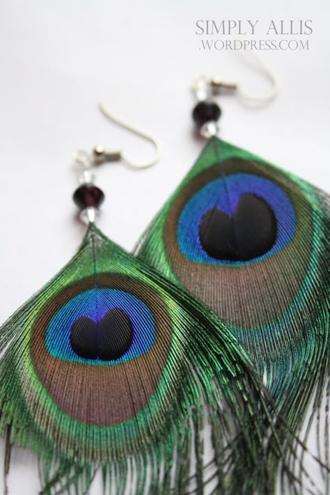 A few days ago my brother presented me with a challenge.  He found these two beautiful peacock feathers in the yard of a friend and asked me to make them in to earrings that he could give as a Chri… Peacock Feather Jewelry, Feather Earrings Diy, Brother Presents, Peacock Crafts, Peacock Feather Earrings, Peacock Jewelry, Peacock Earrings, Makeup Bridal, Peacock Wedding