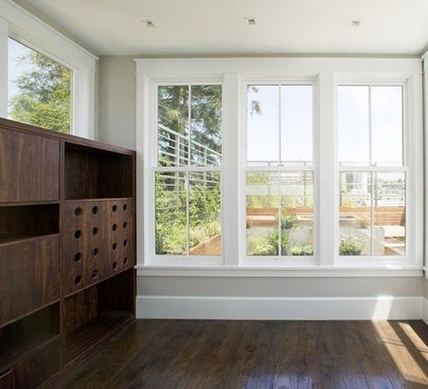 Last weekend, I took the annual AIA tour of Bay Area residences; one of the most appealing homes on the circuit was a 1906 Victorian Pacific Heights remode Triple Window, Wood Baseboard, Baseboard Styles, Baseboard Trim, Victorian Townhouse, Window Molding, White Windows, Window Trim, Eco House