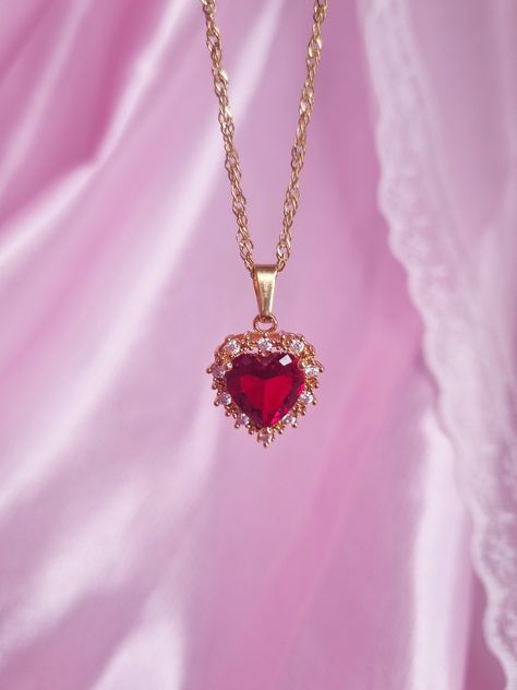 18k Gold Plated Princess Red Heart Necklace 👑 Material: Gold, ZIRCON. Stainless Steel  Length: Adjustable length (MAX 16 Inches) Closure: Lobster claw Luxury Gold Plated Red Necklace, Affordable Personalized Red Necklaces, Cute Heart Charm Jewelry For Valentine's Day, Cute Clavicle Chain Jewelry For Valentine's Day, Delicate Red Jewelry For Valentine's Day, Delicate Red Valentine's Day Jewelry, Dainty Gold-plated Charm Necklace For Valentine's Day, Dainty Gold Plated Charm Necklace For Valentine's Day, Cute Heart Cut Jewelry For Valentine's Day