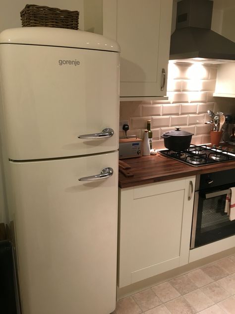 So glad we bought the Gorenje instead of the Smeg - it's beautiful in our new… Cream Fridge, Retro Refrigerator Kitchen, Kitchen With Retro Fridge, Cream Smeg Fridge, Smeg Fridge Kitchen, Retro Fridge Kitchen, Smeg Fridge White, Refrigerator Smeg Vintage Kitchen, Smeg Cream Refrigerator