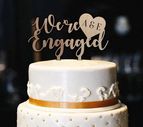 Excited to share the latest addition to my #etsy shop: We're Engaged Cake Topper w/Initials, Rustic Engagement Cake Topper, Bridal Shower Cake Topper, Cake Topper Engagement Party https://etsy.me/2S5lZWu #weddings #decoration #rusticengagement #rusticcaketopper #engage Engaged Cake Topper, Engaged Cake, Engagement Party Cake, Wooden Cake Topper, We're Engaged, Bridal Shower Cake Topper, Engagement Cake Toppers, Fathers Day Cake, Rustic Cake Toppers