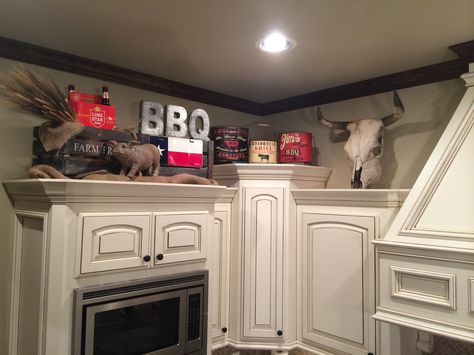 Above kitchen cabinets decor. Texas BBQ decor. Letters- Michael's  // Crates & Pig - HomeGoods // Dried Wheat & Burlap- HobbyLobby //  LoneStar Beer - Local Liquor store  // BBQ buckets- ELC Collections Furniture Store //  Cow skull - Friends family farm Western Above Cabinet Decor, Antlers Above Kitchen Cabinets, Western Decor Above Kitchen Cabinets, Over Kitchen Cabinet Decor, Kitchen Cabinet Decor Above, Large Kitchen Layout, Above Cabinet Decor Kitchen, Above Kitchen Cabinet Decor, Above Kitchen Cabinet