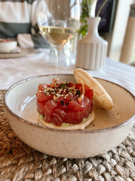 Indulge in a burst of flavors with our tantalizing tuna tartare topped with creamy avocado and served on a crispy rice cracker. Perfect for any occasion, from elegant dinner parties to casual get-togethers or light lunch, this tuna tartare is sure to be a crowd-pleaser. Dinner ideas | dinner recipes | healthy dinner ideas | dinner party menu ideas | tuna tartare plating | tuna recipes | tuna tartare recipe easy | Tuna Tartare Recipe, Dinner Party Menu Ideas, Party Menu Ideas, Recipes Tuna, Tartare Recipe, Rice Cracker, Tuna Tartare, Healthy Dinner Ideas, Crispy Rice