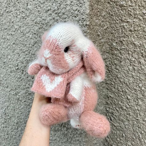 Craft a cuddly toy with our free pattern for a plush amigurumi bunny, perfect for snuggling. This delightful project is sure to be a hit with kids and adults alike. Explore our extensive collection of free and paid crochet patterns on various topics for more inspiration!#Rabbit_Stuffed_Toy #Pink_Bunny_Crochet #Knit_Plushies #Holland_Lop_Bunny Rabbit Stuffed Toy, Pink Bunny Crochet, Knit Plushies, Crochet Rabbit Free Pattern, Knitted Crafts, Holland Lop Bunny, Knit Bunny, Lop Bunny, Knitted Bunny