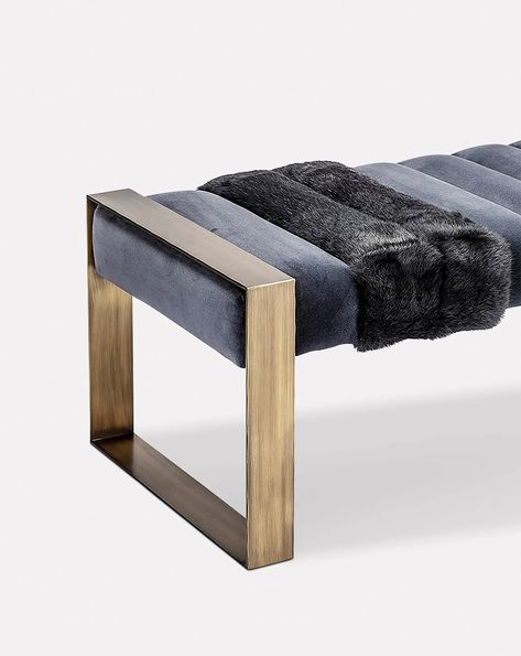 The Dawn Bench features a horizontal seat supported by open metal legs at either end. The clean-lined form gives the bench a contemporary feel, while the unusual upholstery adds a characterful element. The seat's comfortable cushioning is upholstered in cotton velvet fabric. Two sections are covered with soft fur that introduces a touch of femininity and luxury. This elegant design can be used to elevate a bedroom, hallway or living space. For COM options, please contact us. Luxury Bench Seating, Bench Design, Blue Bench, Bed Chair, Bench Designs, Wall Sculpture Art, Bedroom Hallway, The Dawn, Table Storage