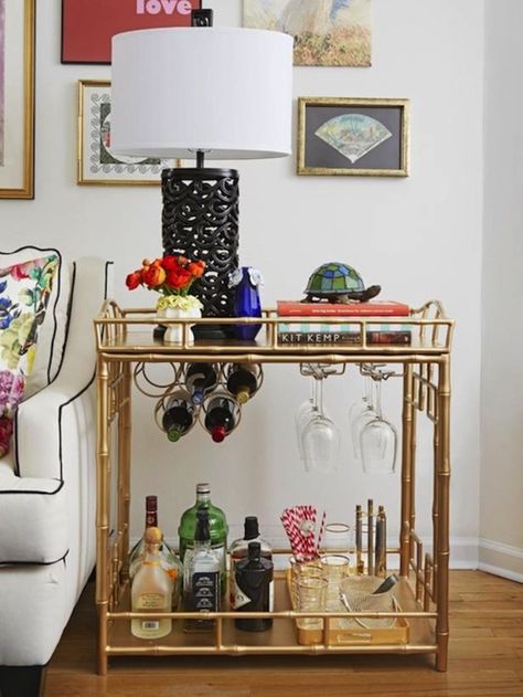 5 tips for organizing your bar essentials in style | archdigest.com Ideas De Mini Bar, Game Cheap, Bar Deco, Gold Bar Cart, Bamboo Bar, French 75, Small Living Room Design, Budget Apartment, Small Room Decor