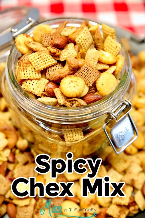 Spicy Chex Mix is an all-time favorite snack perfect for the holidays or any get together. Crunchy cereal, mixed nuts and oyster crackers seasoned with a spicy garlic ranch seasoning. Spicy Ranch Chex Mix Recipes, Chex Mix Recipes Savory Bold, Cajun Chex Mix Recipes, Spicy Chex Mix Recipes, Crackers Seasoned, Chex Mix Recipes Spicy, Spicy Chex Mix, Chex Mix Original, Chex Mix Recipes Original