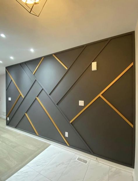 3d Feature Wall Ideas, Panaling Designs Bedroom, Black And Gold Accent Wall Bedroom, Black And Gold Feature Wall, Gold And Black Accent Wall, Accent Wall With Lighting, Geometric Tv Wall Design, Panaling Designs Living Room, Black Wall Gold Accents