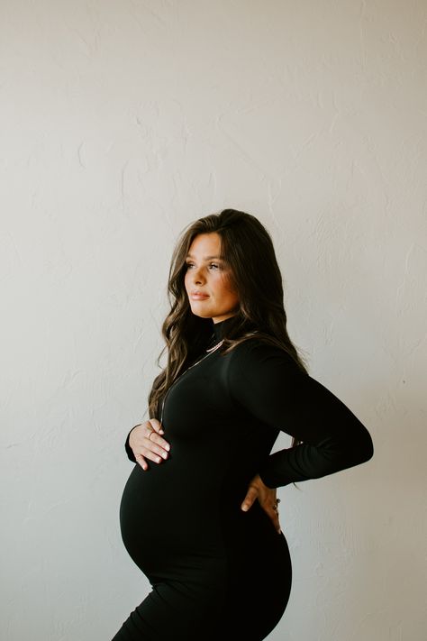 Winter Maternity Pictures Dress, Black Dress Maternity Dress, Maternity Pics Black Dress, Mommy Me Maternity, Indoor Diy Maternity Photoshoot, Maternity Photo Dress Fall, Tight Pregnancy Dress, Indoor Maternity Photoshoot Outfits, Black Maternity Pictures Outfits