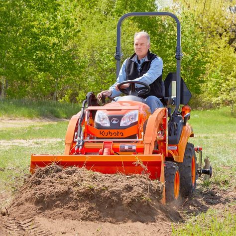 With long-running diesel engines and chassis made for chores, tractors are workhorses for any landowner. If you measure your property in the thousands of acres, you need a full-size tractor. For those with 1 to 100 acres, consider a compact or subcompact tractor. Tractor Attachment Storage, Bolens Garden Tractor, Kubota Compact Tractor, Ford 8n Tractor Attachments, Compact Tractor Attachments, Garden Tractor Front End Loader, Yard Tractors, Garden Tractor Attachments, Garden Tractor Pulling