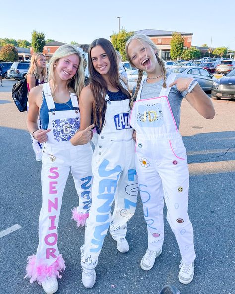 Spirt Overalls School, Senior Year Overall, Hoco School Spirit Day, Pink Out Overalls Spirit Week, Senior Jeans Painted 2023 Blue, Pink Out Pants Spirit Week, School Spirit Day Ideas Outfits, Senior Day Outfits, Senior Year Overall Ideas