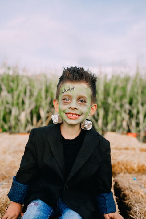 DIY Frankenstein Costumes - Twist Me Pretty Simple Frankenstein Costume, Easy Diy Frankenstein Costume, Diy Frankenstein Bolts, Frankenstein Makeup For Kids, Diy Kids Frankenstein Costume, Kid Frankenstein Costume, Frankenstein Bolts, Homemade Frankenstein Costume Kids, Frankenstein Costume Kids Diy