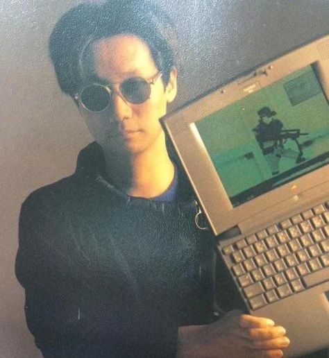 Hideo Kojima with Metal Gear Solid (1990's) Metal Gear Solid Series, Hideo Kojima, Metal Gear Series, Kojima Productions, Rare Pictures, Metal Gear Solid, Metal Gear, Round Sunglass Men, Cyberpunk