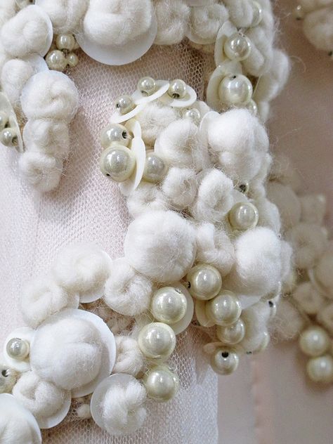 Surface Adornment - embellished fabric design with white wool balls, sequins  pearls - haute couture dress detail Givenchy Givenchy Haute Couture, Detail Couture, Haute Couture Embroidery, Fashion Textiles, Fashion Embroidery, Couture Embroidery, Textiles Techniques, Wool Balls, Design Textile