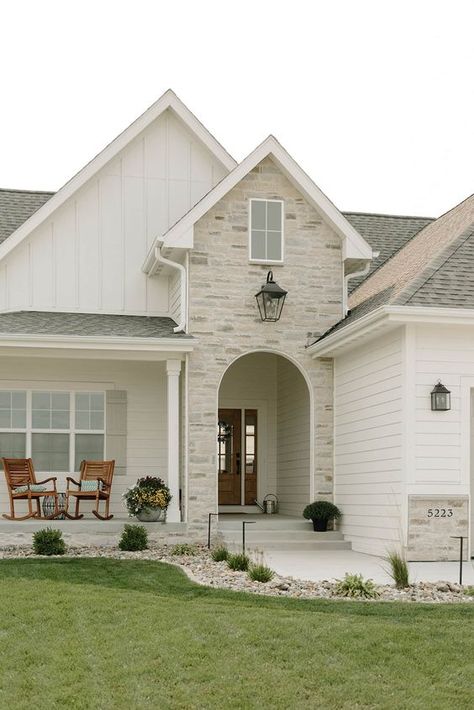 James May Homes Metal Roof Modern Farmhouse, Charcoal Siding With Brick, White And Grey Homes Exterior, Light Wood House Exterior, House Exterior Material Ideas, Farmhouse White Windows Exterior, White Home Exterior With Stone, Light Colored Exterior Homes, White Farmhouse With Stone Exterior