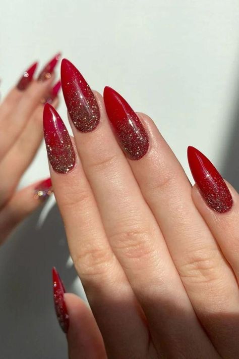 21 Elegant Red Glitter Almond Nails Designs | Stunning & Stylish Nail Ideas Red Base Nail Designs, Red Gold Ombre Nails Glitter, Red Christmas Nail Designs Almond, Red Nails With Glitter Ombre, Red Glitter Ombré Nails, Red Gold Ombre Nails, Red And Silver Sparkle Nails, Red Glitter Ombre Nails Acrylic, Red Almond Nails Designs Glitter