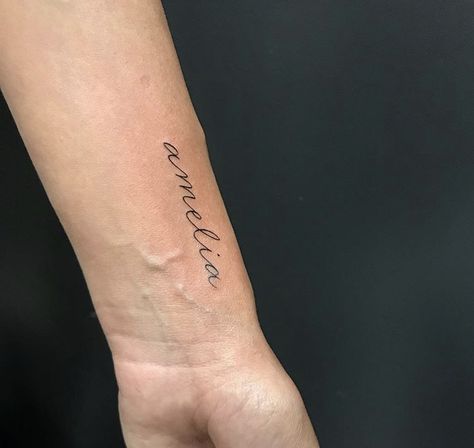 #Amelia #name #tattoo Cute Last Name Tattoos, Name Tattoo Feminine, Amelia Name Tattoo Ideas, Back Of Arm Name Tattoo, Name Tattoo Danty, Where To Get A Name Tattoo, Placements For Name Tattoos, Amelia Tattoo Name Fonts, Kamila Name Tattoo