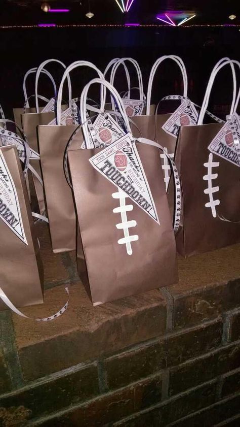 Football party favor bags Football Party Favors For Kids, Football Kids Birthday Party, Birthday Ideas For Women Party, Raiders Birthday Party, Football Birthday Party Favors, Raiders Party, Dallas Cowboys Birthday, Dallas Cowboys Party, Football Thanksgiving