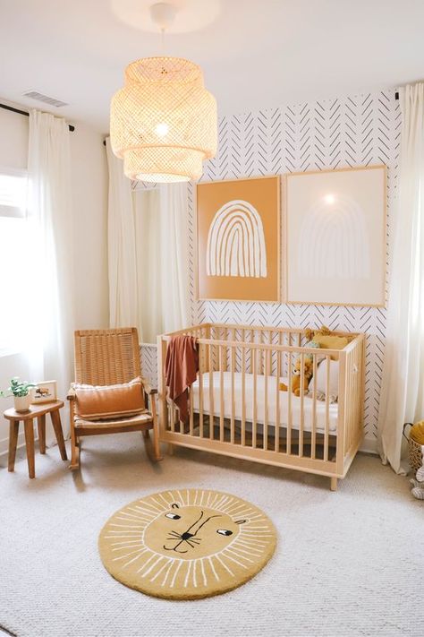 a gender neutral nursery with bold orange and burnt orange touches, an accent wall and a lion rug Nursery Wallpaper Accent Wall, Gender Neutral Nursery Inspiration, Nursery Inspiration Neutral, Gender Neutral Nursery Design, Nursery Design Neutral, Nursery Idea, Gender Neutral Nursery Decor, Baby Room Neutral, Baby Nursery Neutral