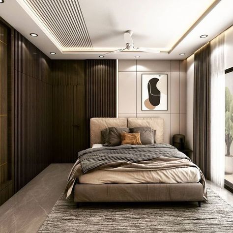 The Bedroom has a Combination of Grey, Beige & Brown Consists of a Single 🛏 Bed with Wooden Legs & Square Cushioned Backrest. The 👔 Wardrobe has Vertical Grooves & the same Groove Pattern is Continue in the Ceiling. Study 📚 Table on the Opposite Wall has Space for Working Desk, Book Shelves & Shelves for Décor Items is highlighted by Led Lights. And, POP False Ceiling with Recessed & Cove ✨ Lights complements the Space - GharPedia Pop Grooves On Wall, Pop Groove Ceiling Design Bedroom, Grooves In Ceiling, Wooden Ceiling Bedroom, Ceiling Groove Pattern, False Ceiling Groove Design, Groove Pattern On Wall, Bedroom False Ceiling Design Modern Simple, Bedroom False Ceiling Design Modern